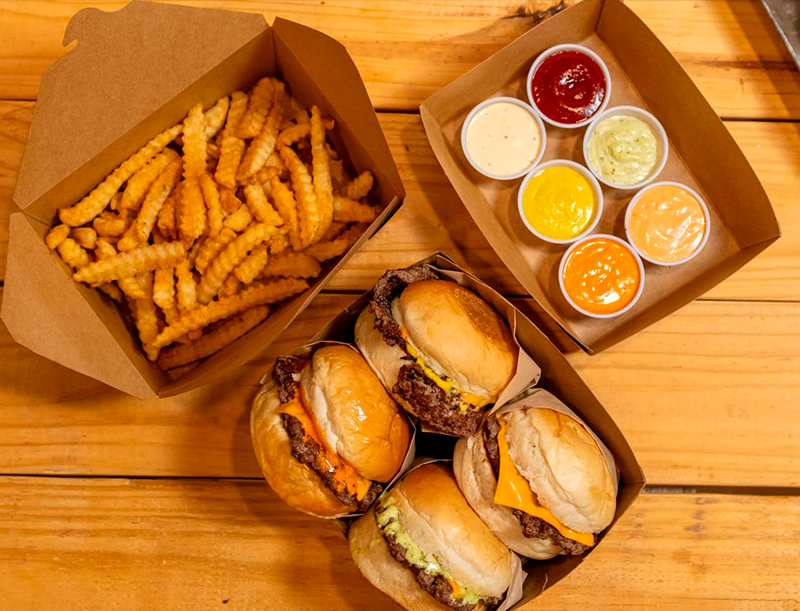 Food Factory food truck serving gourmet burgers at an event